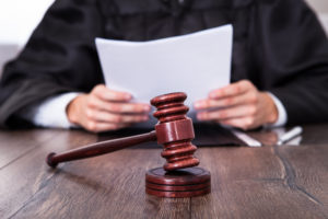 Criminal Defense Attorney Atlanta, GA- judge with wooden gavel on table